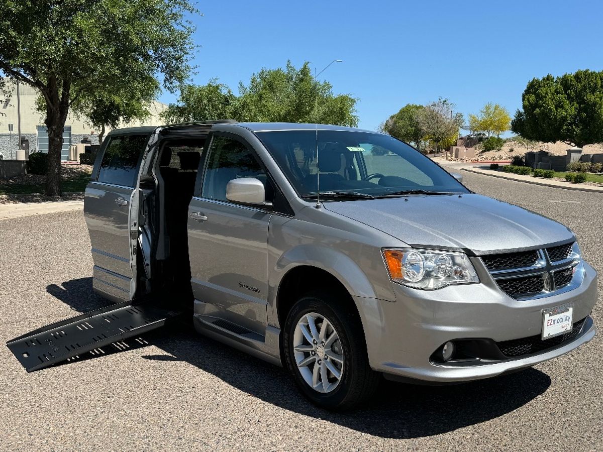 Silver Dodge Grand Caravan with BraunAbility Side Entry Automatic Fold Out conversion