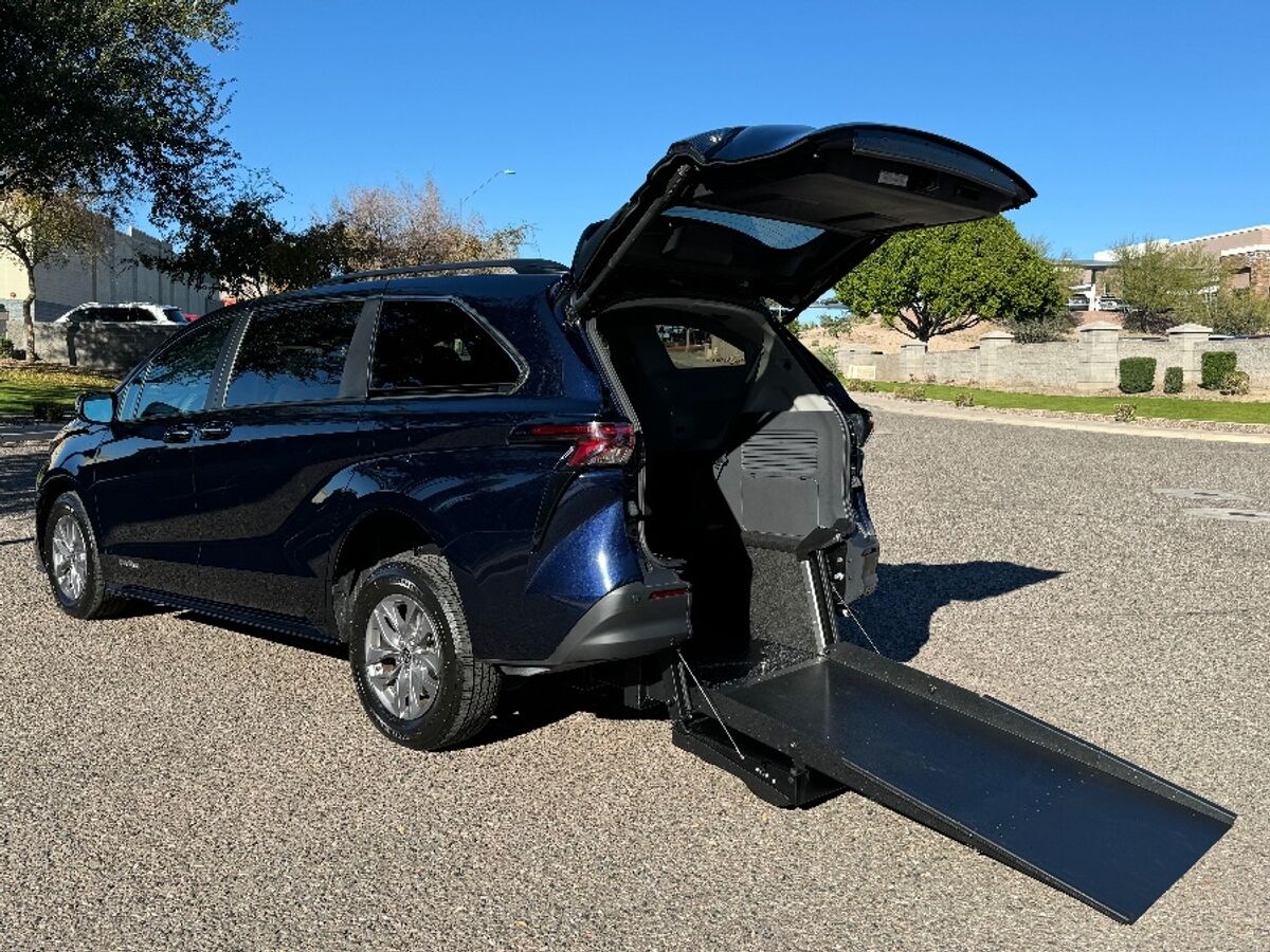 Blue Toyota Sienna with Driverge Rear Entry Manual Fold Out conversion