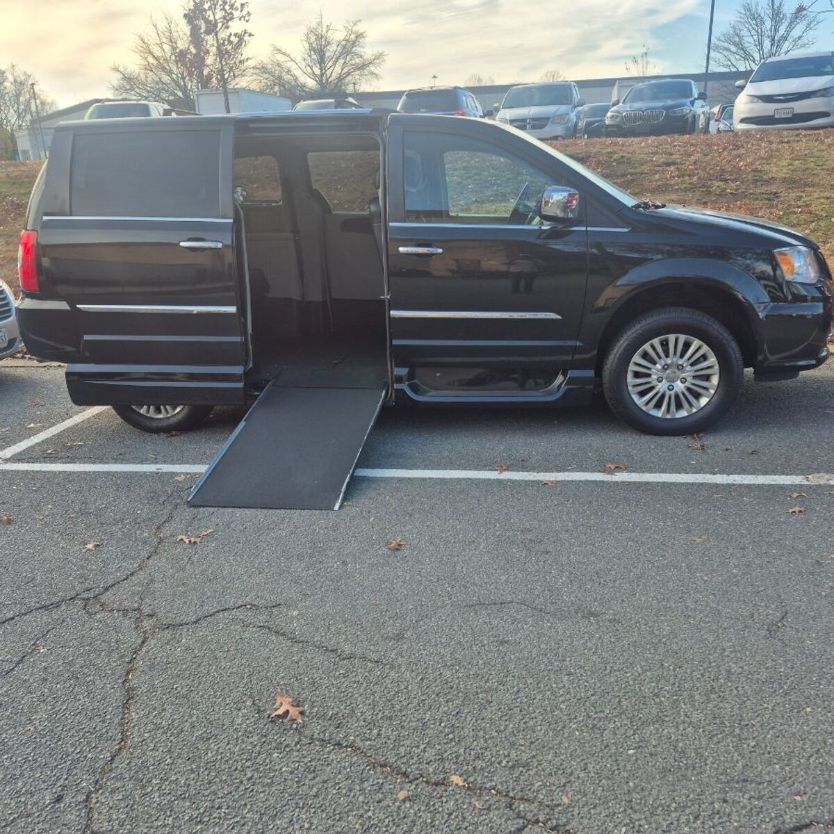 Black Chrysler Town and Country with Vantage Mobility Side Entry Automatic In Floor conversion